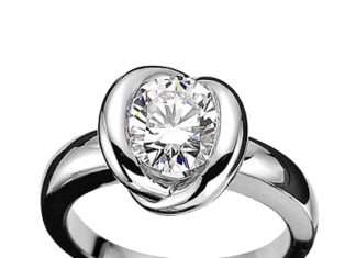 Обручки з білого золота. Фото розкішних кільця з білого золота з діамантами